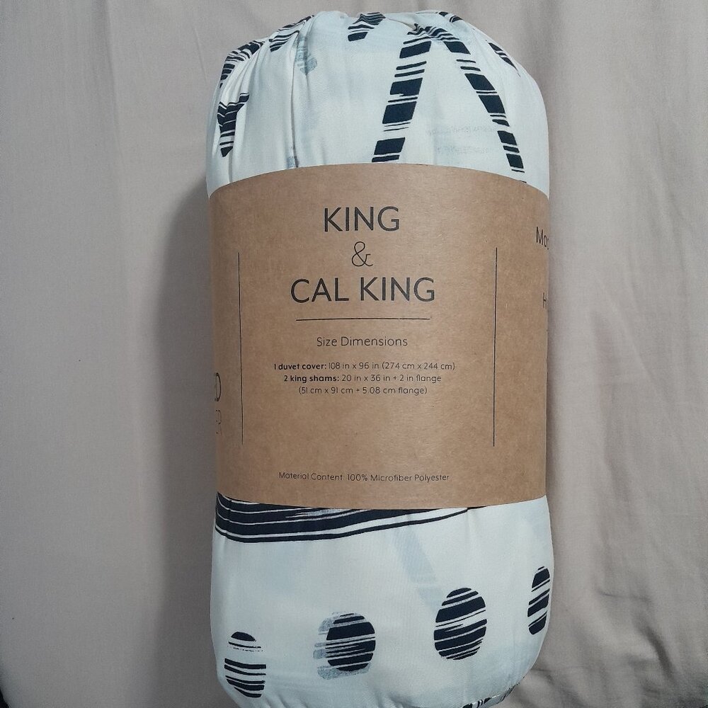 Cream or tan and black three-piece king size duvet cover